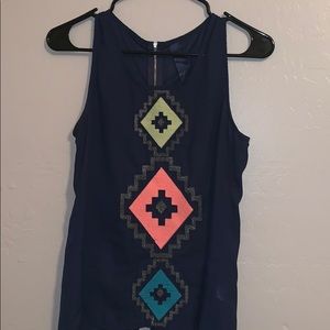 Navy blue top with design.